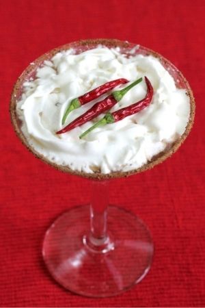 Santa Tini cocktail with red chillies (easy on the tini)